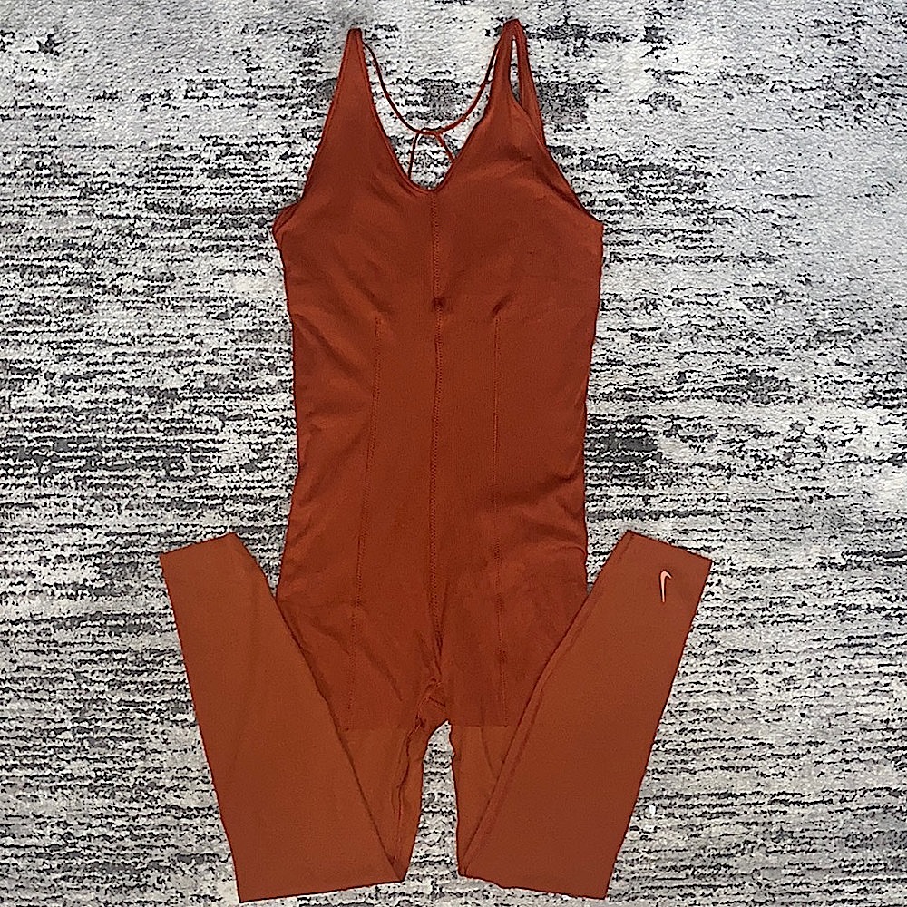 NWOT NIKE YOGA LUX LAYERED ROMPER SIZE MEDIUM